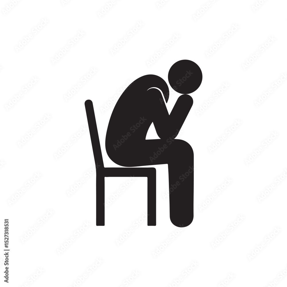 Fototapeta premium A person sitting on a chair looking depressed and sad