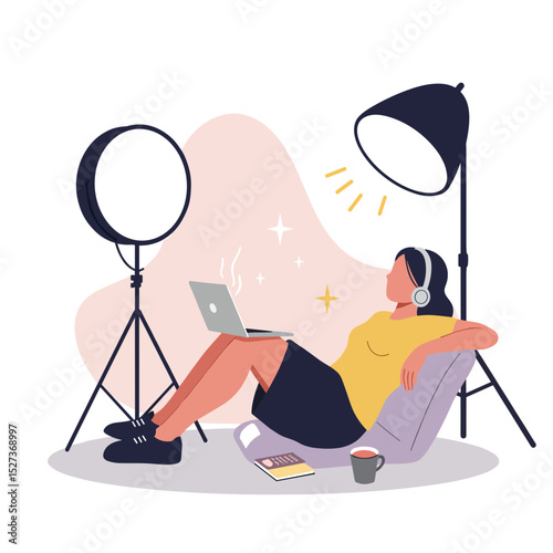 Woman relaxing with laptop and coffee after content shoot at home  