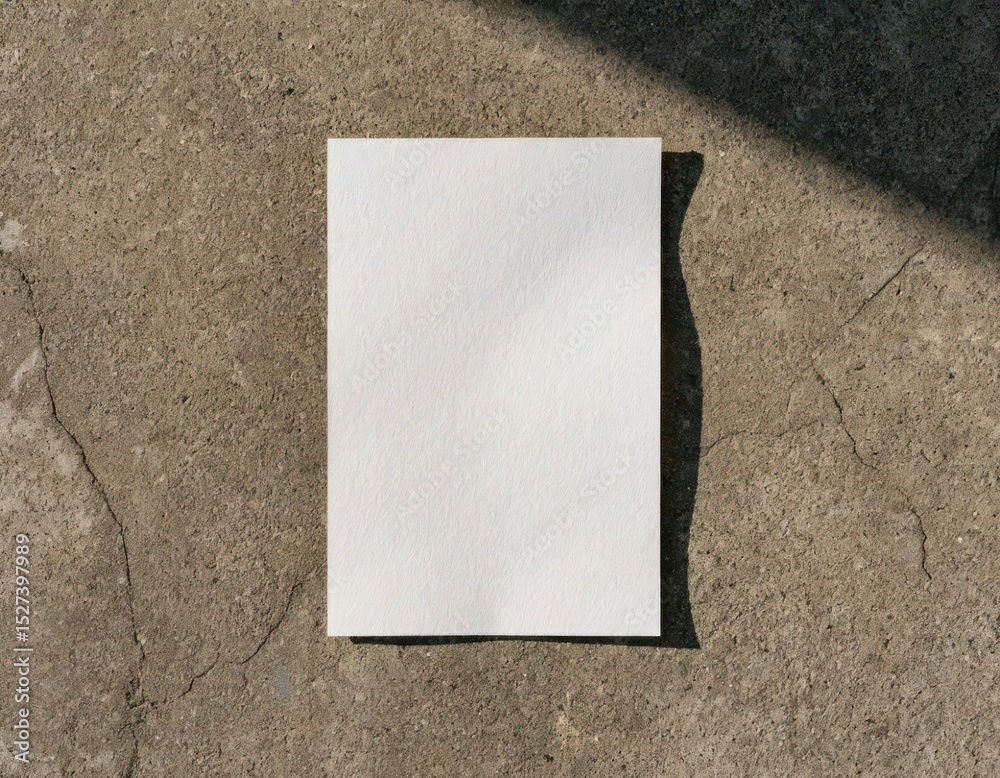 Fototapeta premium White Paper on Concrete – Minimal Texture Contrast Flat Lay