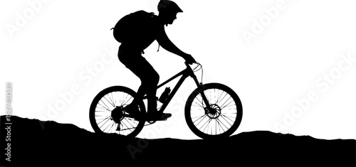 Silhouette of a mountain biker riding on uneven terrain, with a backpack and helmet