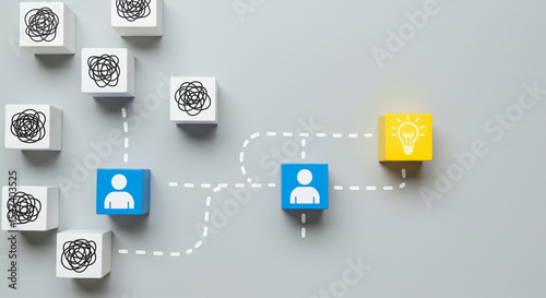 Blocks showing problem solving process with people and idea on a gray background in a flat lay business.selling ,purchasing,agreement 