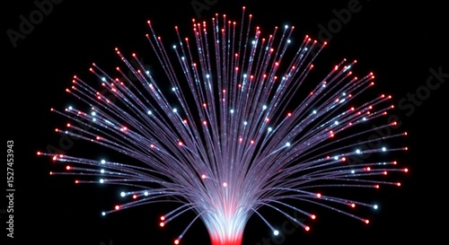 Glowing fiber optic strands bursting outwards.