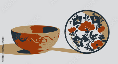 A wooden bowl with carved waves next to a white ceramic plate with red and blue floral patterns.