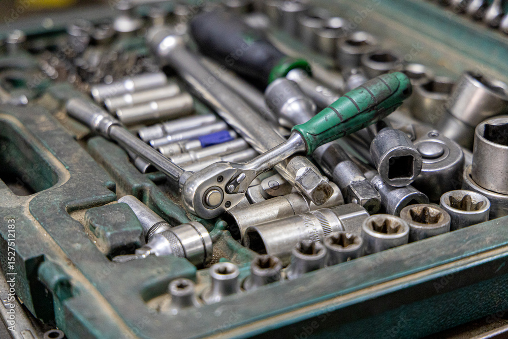 Fototapeta premium Closeup photo shoot of different nesessary tools and parts in every man's garage.Auto check up and car service shop concept.Different type of tools, especially wrenches.