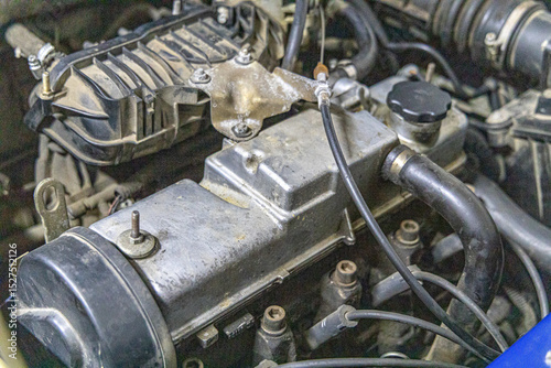 Closeup photo shoot of different nesessary tools and parts in every man's garage.Auto check up and car service shop concept.Different type of tools, especially wrenches.car engine repair.