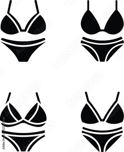Set of four black and white swimwear bikini silhouettes for design and graphic elements