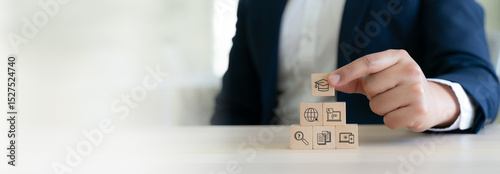 Online Education and E-Learning Concept. Wooded blocks with educational tool icons, remote and online learning, digital training, webinars on the internet for personal development.