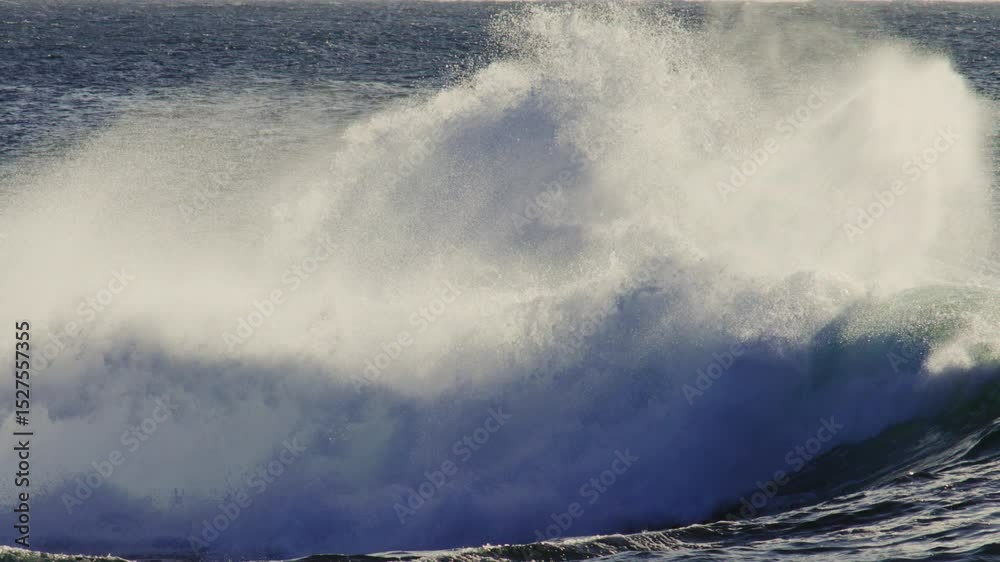 Powerful wave crashes high under dusk skies, white spray fills air in slow motion impact moment Powerful wave crashes high under dusk skies, white spray fills air in slow motion impact moment
