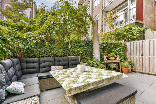 Cozy Outdoor Patio with Lush Greenery