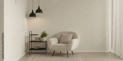 Minimalist modern living room interior with cozy beige armchair, black pendant lights, and green houseplant on neutral rug
