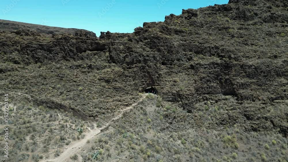 Aerial view of the entrance to the Ansite Fortress cave on the island of Gran Canaria, Spain. Aerial view of the entrance to the Ansite Fortress cave on the island of Gran Canaria, Spain.