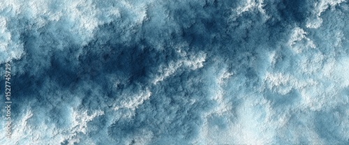 An abstract texture featuring various shades of blue, conveying a sense of depth and fluidity, reminiscent of water or sky.