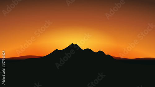 Mountain landscape sunset with dark silhouette and warm glowing sky