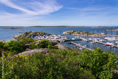 Ships harbour at Saltholmen peninsula on the shore of Alvsborgsfjorden, harbour for archipelago ships, Alvsborg district, Gothenburg, Sweden, sunny day