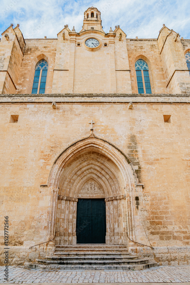 Fototapeta premium Grand Gothic Facade and Main Entrance of Ciutadella de Menorca Cathedral. Historic Spanish church, Mediterranean island, religious building, travel destination, architectural landmark