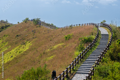 Tai O, Hong Kong 10-20-2024 One of the walking trails on Lantau Island near the fishing village of Tai O. The winding trails take you along the island and provide beautiful views on the natural lands