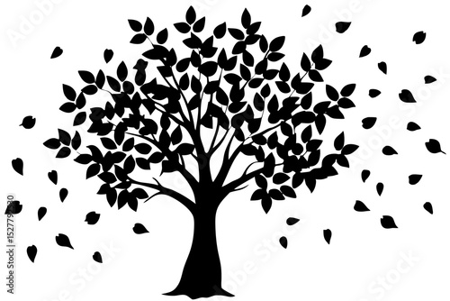 Black silhouette of a tree with falling leaves