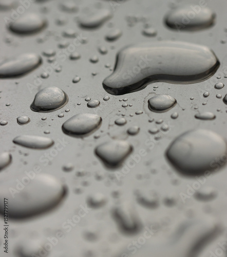 A close up of water droplets on a surface