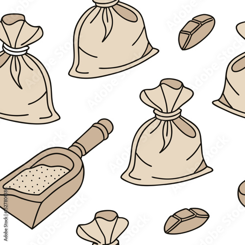 Rustic sacks and a wooden scoop filled with grains isolated on white background