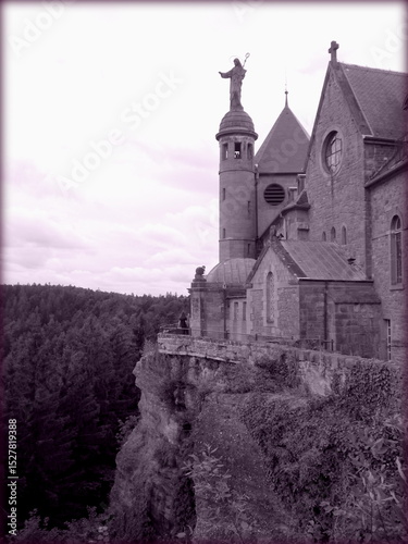 Visit Alsace Region, France: Wide shot on the Mont Sainte-Odile Monastery located at the peak of the Vosges Mountains.