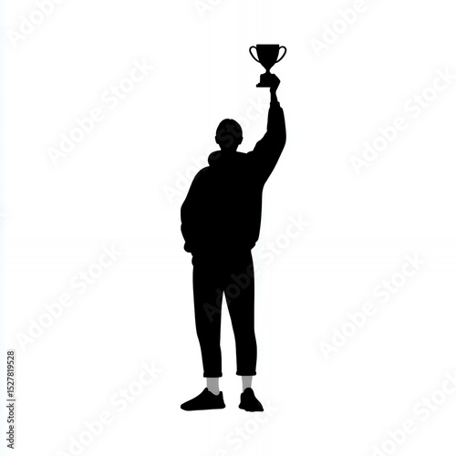 A man is holding a trophy in his hand. He is standing in front of a white background
