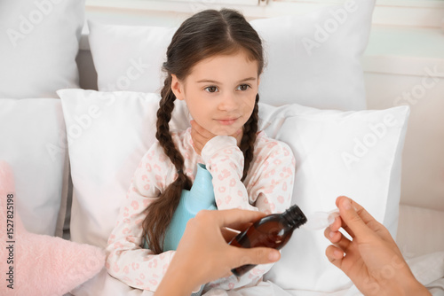 Sick little girl with hot w...
