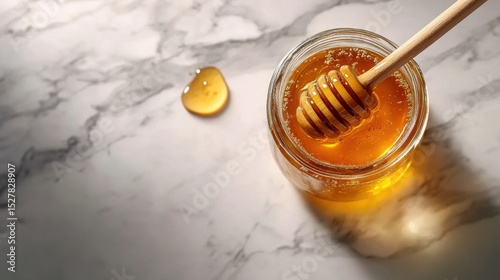 Close-up of a honey jar with a wooden dipper, golden honey dripping on a marble surface in soft natural light.