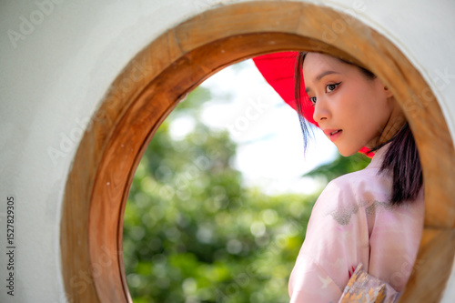 Pretty Japanese woman in elegant traditional  kimono or yukata clothing 