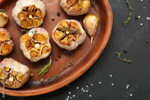 Roasted garlic bulbs with h...