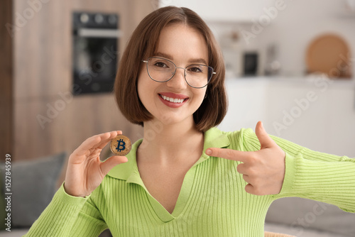 Young woman pointing at bit...