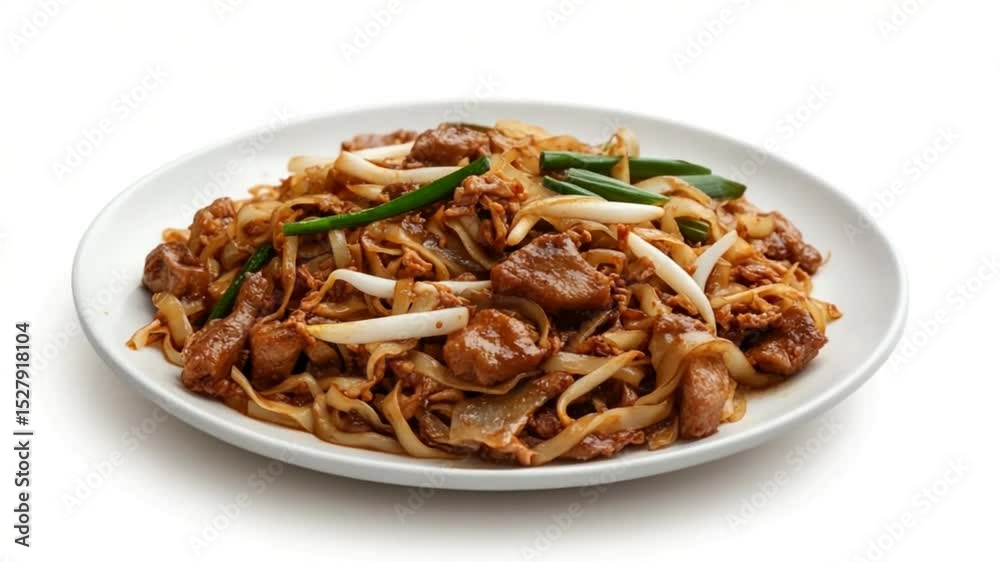 Delicious Char Kway Teow featuring fresh noodles, succulent beef, and vibrant greens Delicious Char Kway Teow featuring fresh noodles, succulent beef, and vibrant greens
