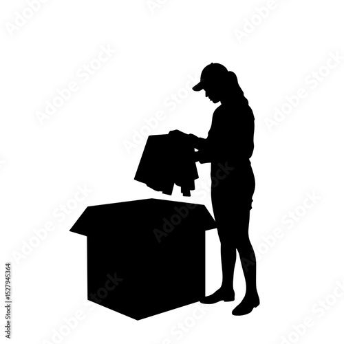 Silhouette of person packing clothing into donation box, reuse and sustainability focus