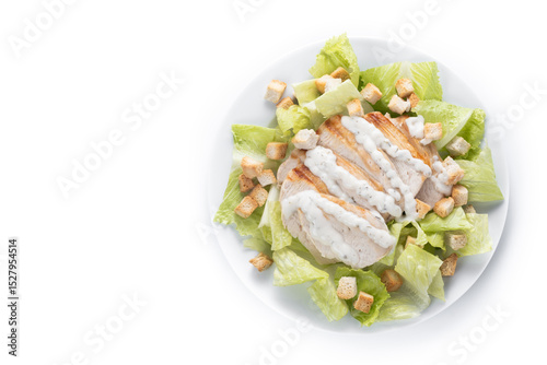 Crunchy Caesar salad with chicken isolated on white background. Top view. Copy space