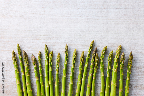 Fresh Green Asparagus on White Wooden Background