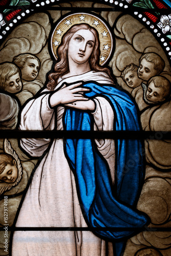 Assumption church.  Stained glass. The Assumption of Mary into Heaven. Lessard en Bresse. France.