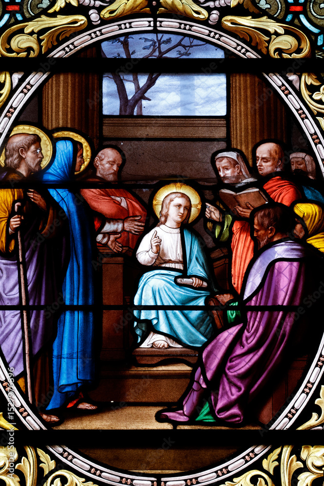 Fototapeta premium Saint Pierre church. Stained glass. Jesus speaks to the teachers of the law. Chalon sur Saone. France.