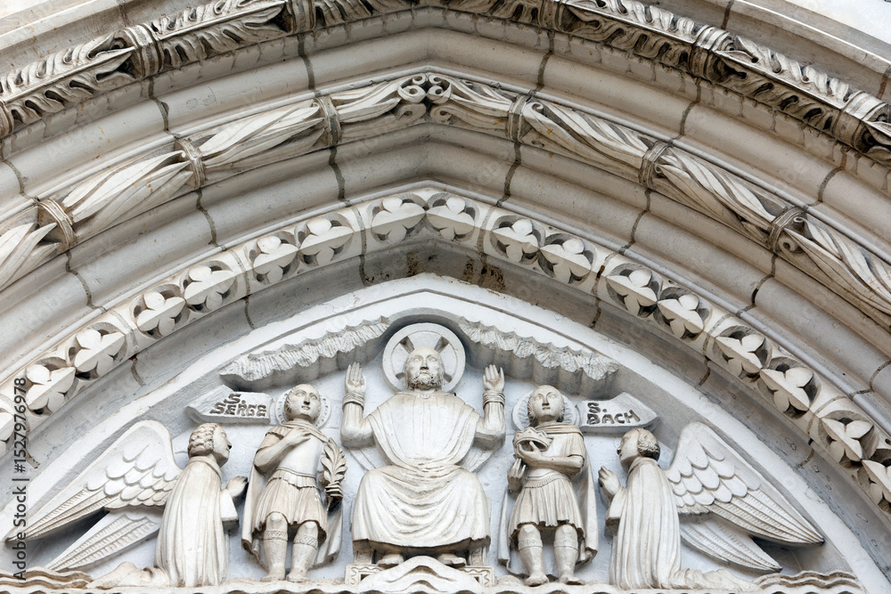 Obraz premium Saint-Serge de Pourrain church. Tympanum. Christ in Majesty. Sculpture. Pourrain. France.