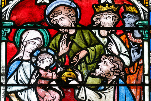 Auxerre cathedral.  Stained glass. Nativity of Jesus or birth of Christ.  Adoration of the Child Jesus by the three wise men or Magi. Auxerre. France.