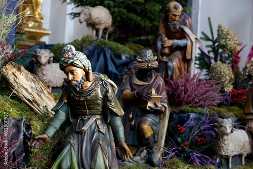 Nativity scene in a church. Nativity of Jesus or birth of Christ.  Adoration of the Child Jesus by the three wise men or Magi. Warsaw. Poland.