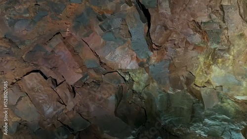Inside Thrihnukagigur volcano with lava rock formations.