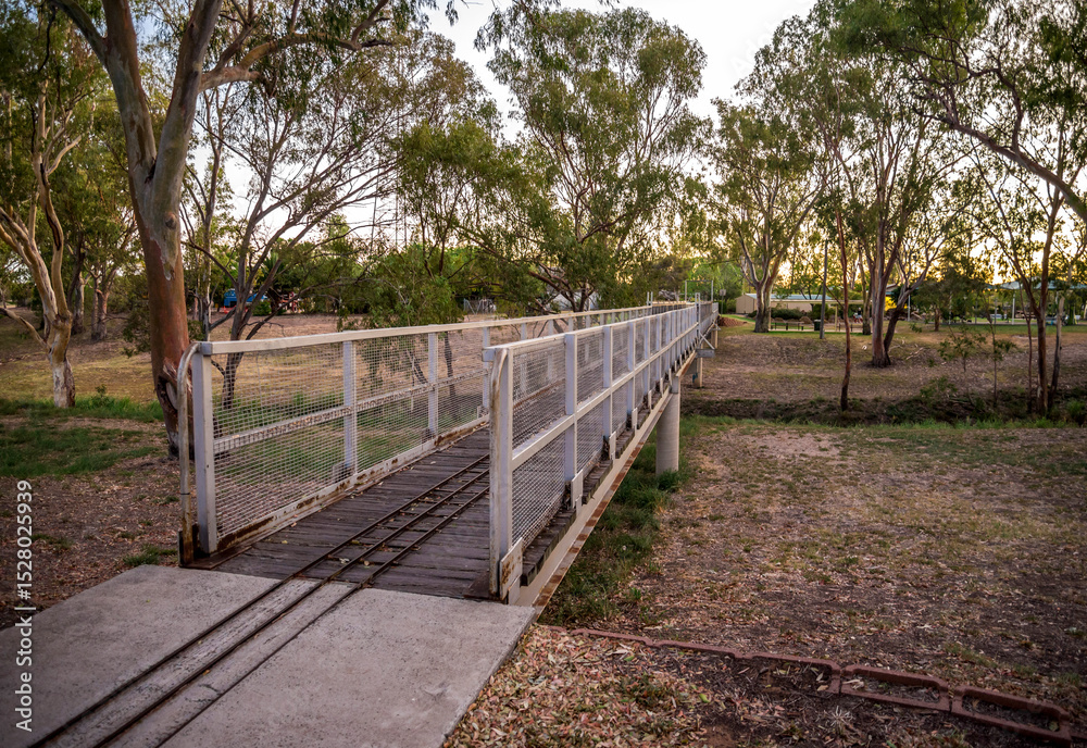 Narrow Railing on a Pedestrian Bridge Over Bungil Creek in Natural Park Setting, Roma, Australia, 28 November 2020 Narrow Railing on a Pedestrian Bridge Over Bungil Creek in Natural Park Setting, Roma, Australia, 28 November 2020