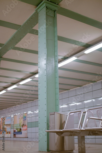 Minimalist Architectural Detail of a Green Steel Support Pillar in a Berlin U-Bahn Subway Station