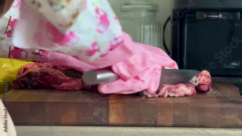 Wallpaper Mural Close-up of slicing raw meat for homemade dog food. Torontodigital.ca