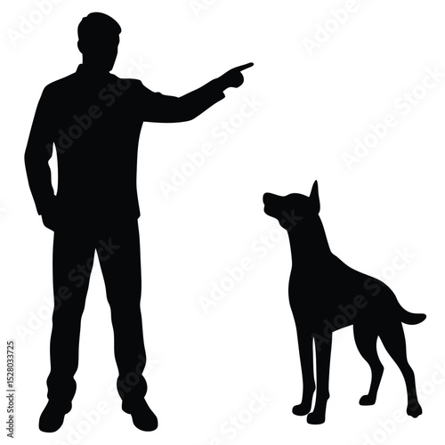 Silhouette of Man Training Dog With Hand Gesture For Obedience