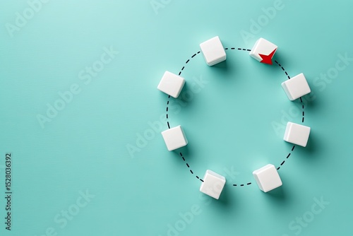 White cubes arranged in a circle with one highlighted