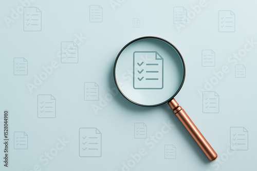 Document checklist audit with magnifying glass for business compliance and regulatory requirements review
