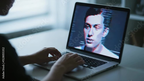 Laptop screen shows a pixelated face flickering with glitch distortions, RGB separation, and pixel blocks as the feed struggles. Ideal for cyber security, hacking, or digital failure concepts.
