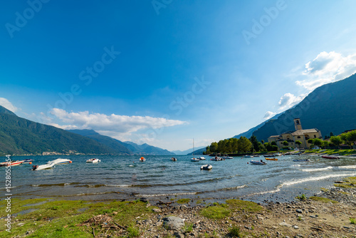 Fototapeta Naklejka Na Ścianę i Meble -  Panorama of Lake Como, with the town of Cremia and the mountains in the background.
