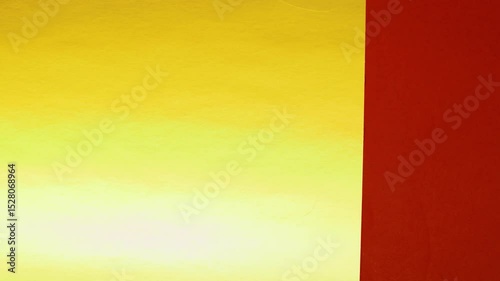 Vivid construction paper backgrounds in bold colors are gently animated by soft, natural shadows gliding across the surface, creating depth, movement, and visual warmth.