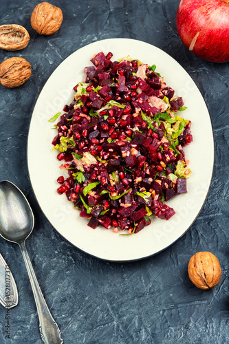 Healthy salad - boiled beetroot with pomegranate.